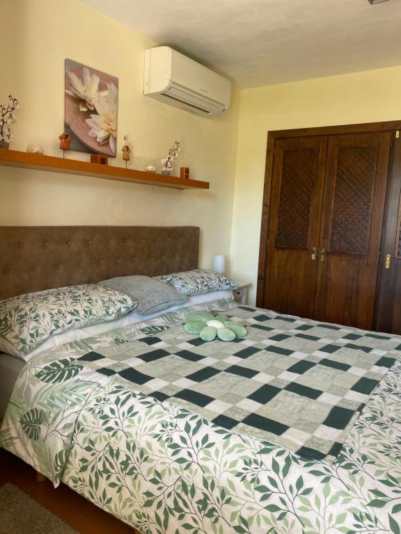 Postel nebo postele na pokoji v ubytování Marina Dor - Cala Egos- Sunny ground floor apartment with large garden