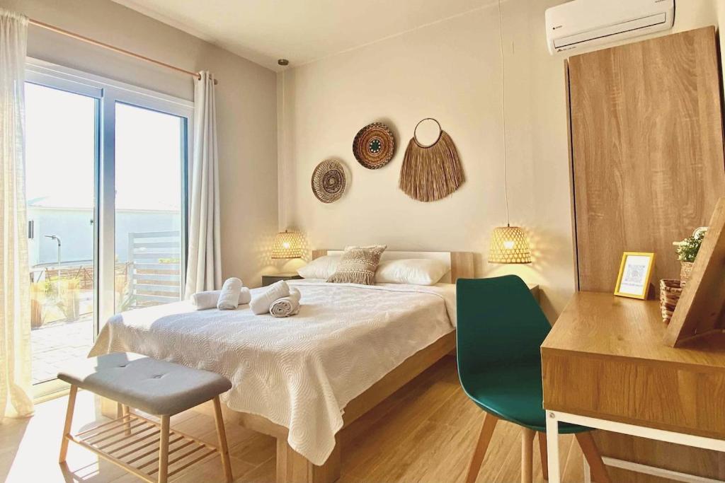 Posteľ alebo postele v izbe v ubytovaní Boho Nomad Seaview Detached House
