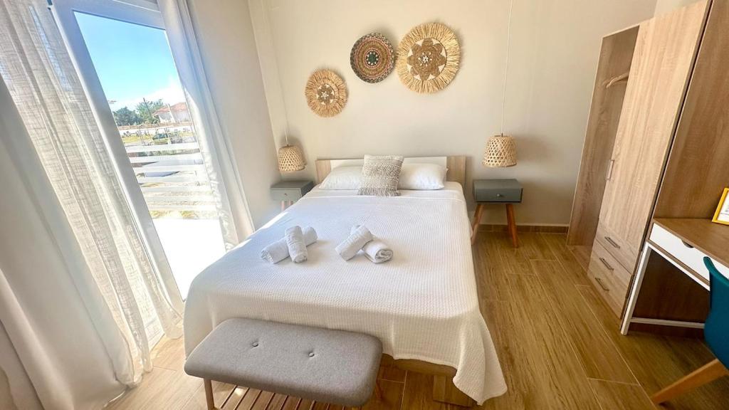 Posteľ alebo postele v izbe v ubytovaní Boho Nomad Seaview Detached House