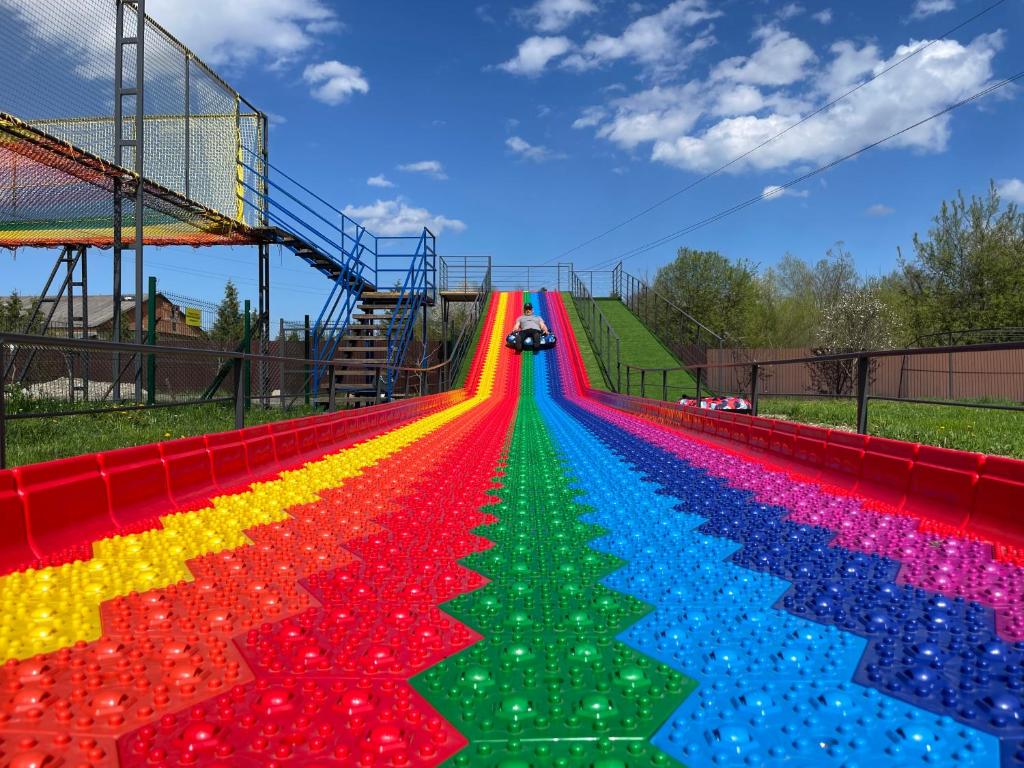 a long rainbow colored track at an amusement park at Stary Mlyn in Yabluniv
