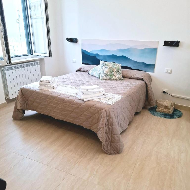 Postel nebo postele na pokoji v ubytování Sea Stone B&B