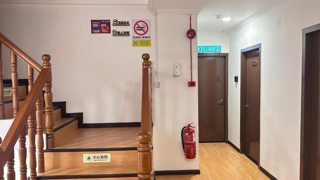Fotografie z fotogalerie ubytování NEW Xing Yue Hotel 星悦自助酒店 v destinaci Sandakan
