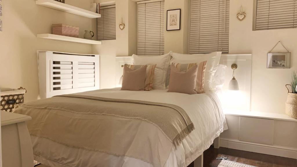 Ένα ή περισσότερα κρεβάτια σε δωμάτιο στο Market Place