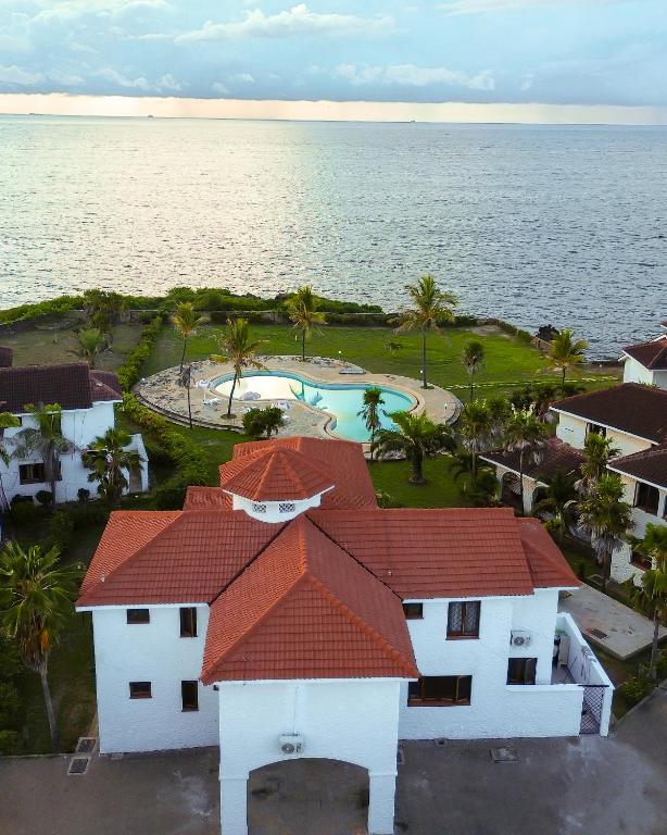 an aerial view of a house and the ocean at Uttoru Creek Villas-Nyali Mombasa in Mombasa