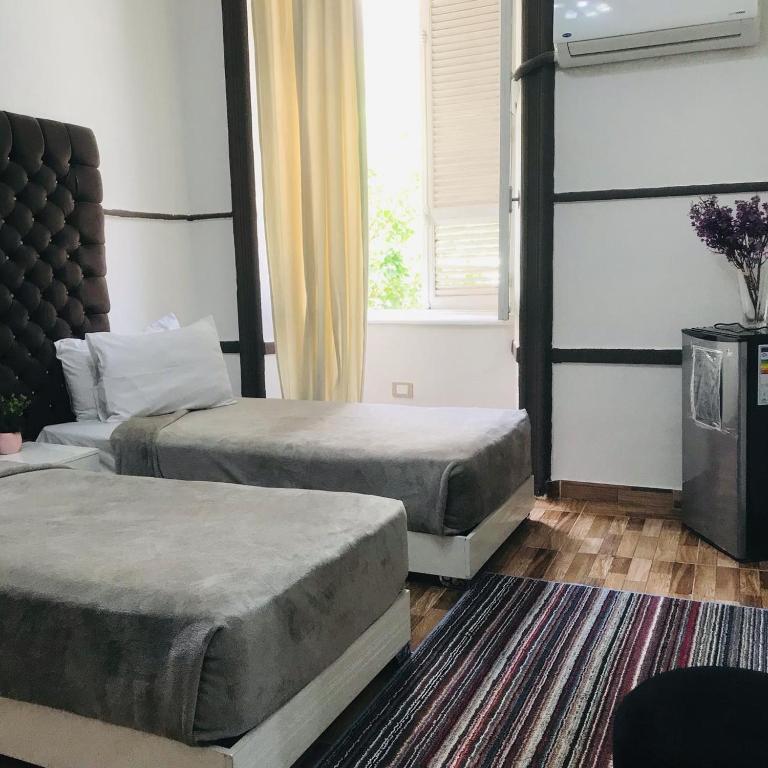 Postel nebo postele na pokoji v ubytování Hotel velvet One