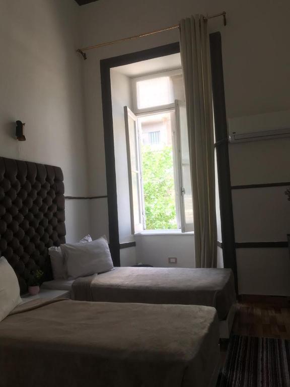 Postel nebo postele na pokoji v ubytování Hotel velvet One