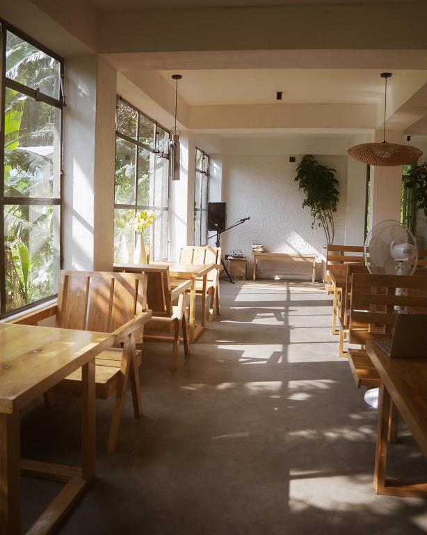 Posezení v ubytování Ashraya Boutique Homestay