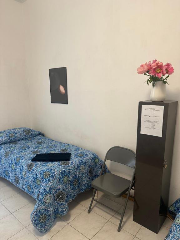 Postel nebo postele na pokoji v ubytování Stanza privata per 4