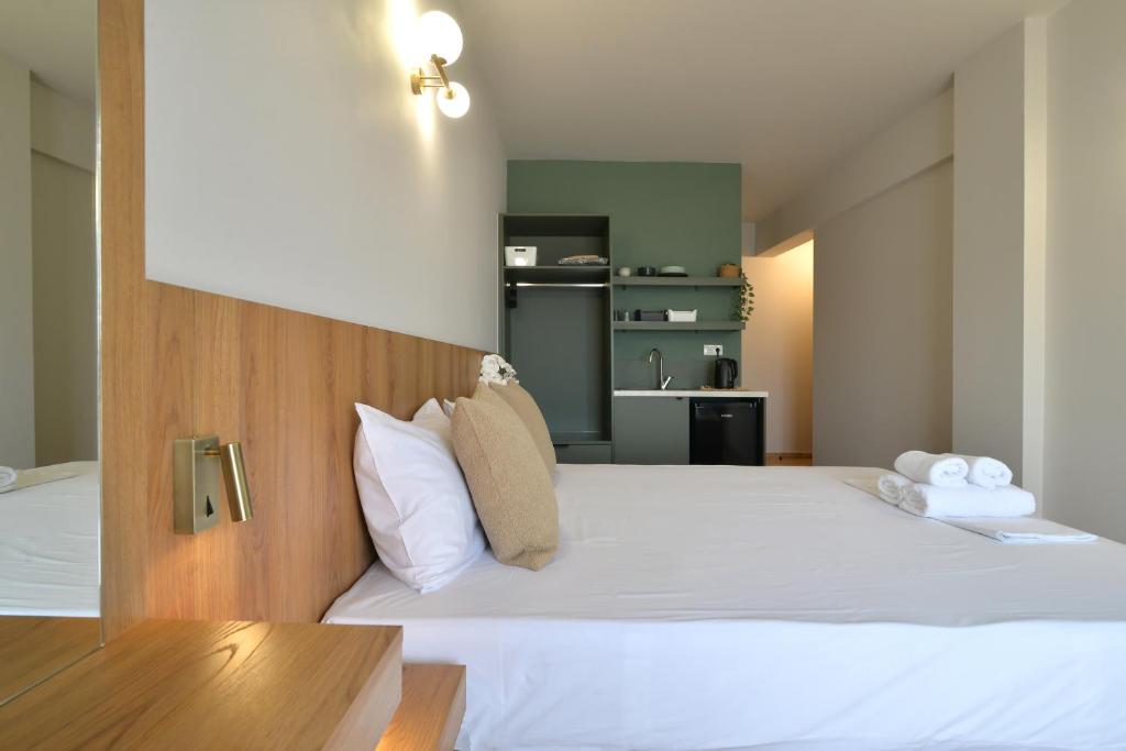 Postel nebo postele na pokoji v ubytování Hotel Akti