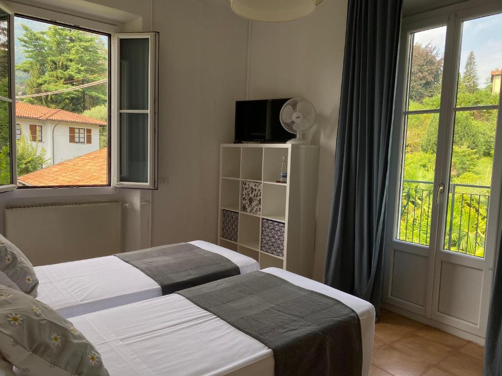 Postel nebo postele na pokoji v ubytování Hotel Loveno