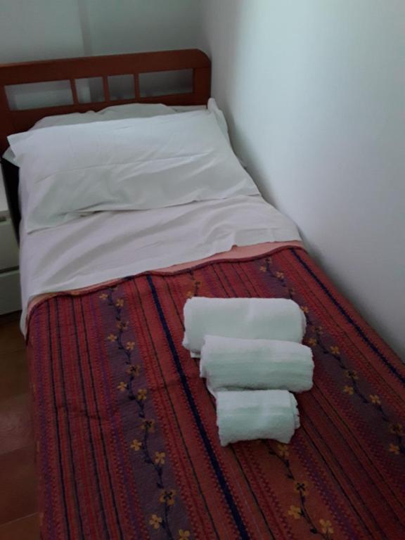 Postel nebo postele na pokoji v ubytování L'Aragosta Guesthouse