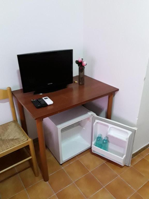 TV a/nebo společenská místnost v ubytování L'Aragosta Guesthouse