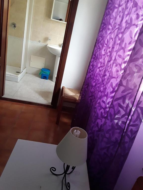 Postel nebo postele na pokoji v ubytování L'Aragosta Guesthouse