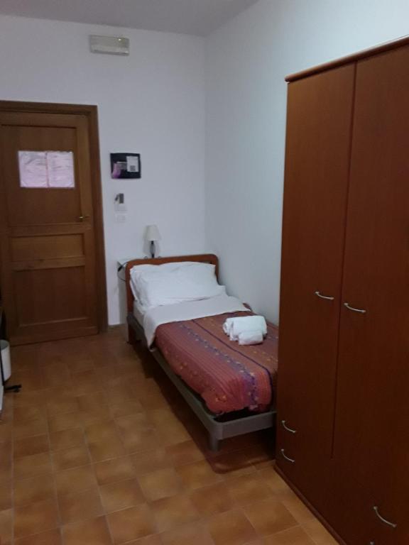 Postel nebo postele na pokoji v ubytování L'Aragosta Guesthouse