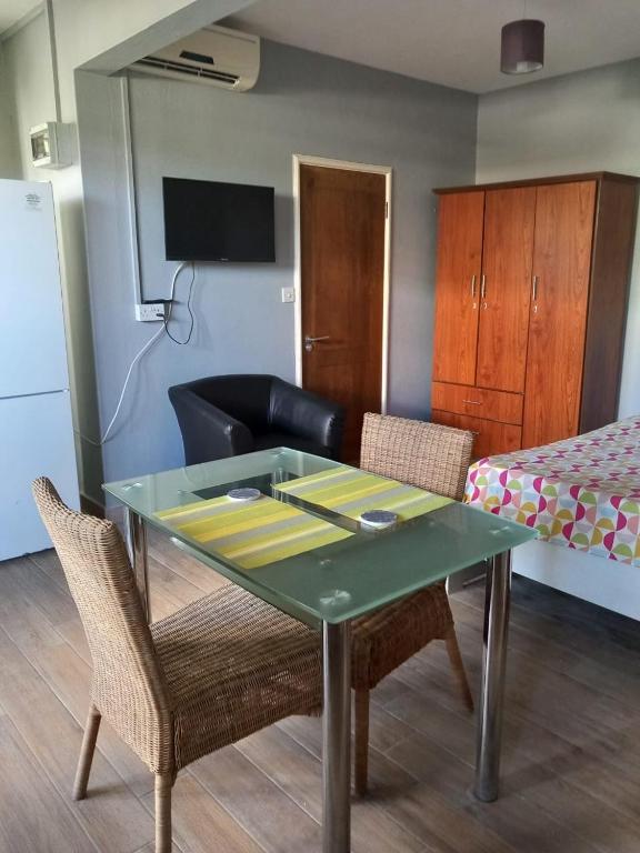 TV a/nebo společenská místnost v ubytování Sacha Tourist Residence 1