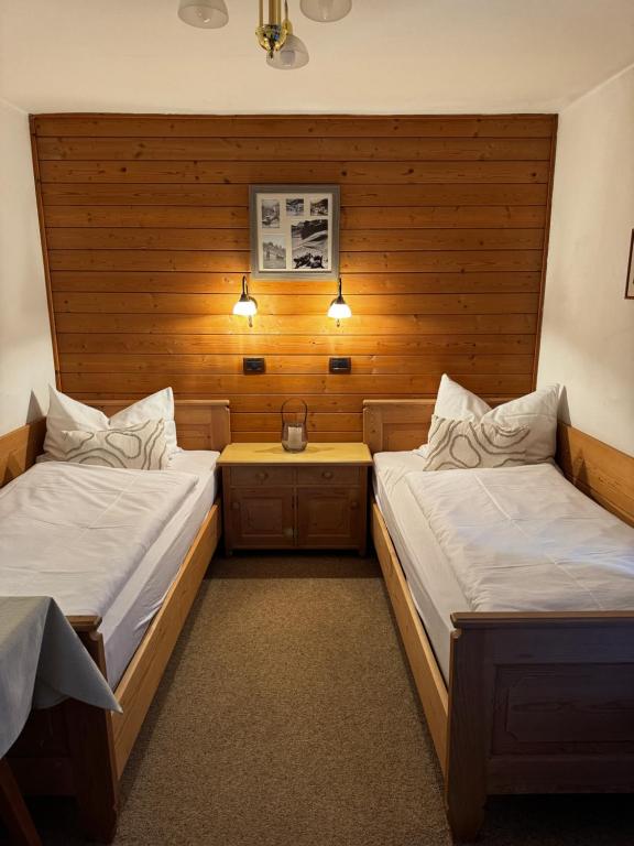 Postel nebo postele na pokoji v ubytování Garni Cir