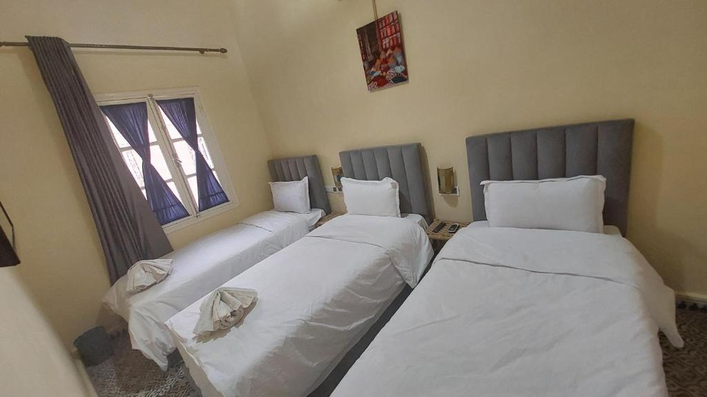 Hotel Mentaga - Üç Kişilik Oda - Özel Banyolu