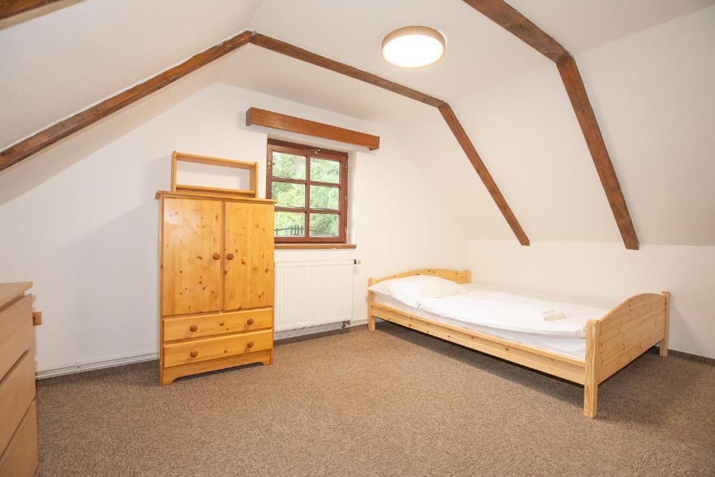 Postel nebo postele na pokoji v ubytování Resort U Jelena