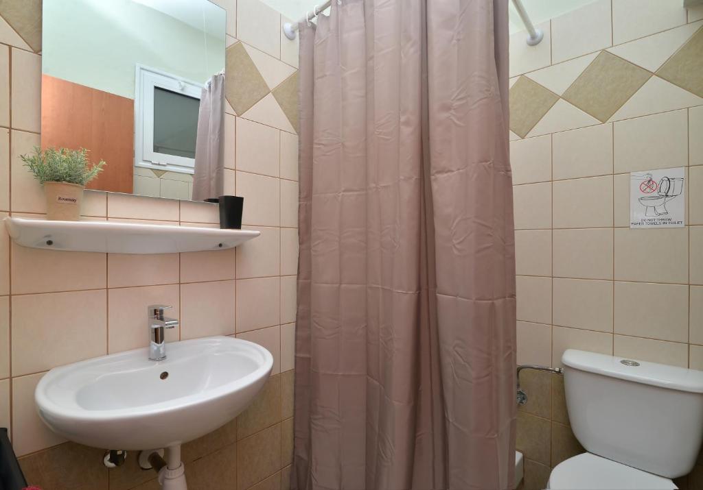 Koupelna v ubytování Hotel Akti