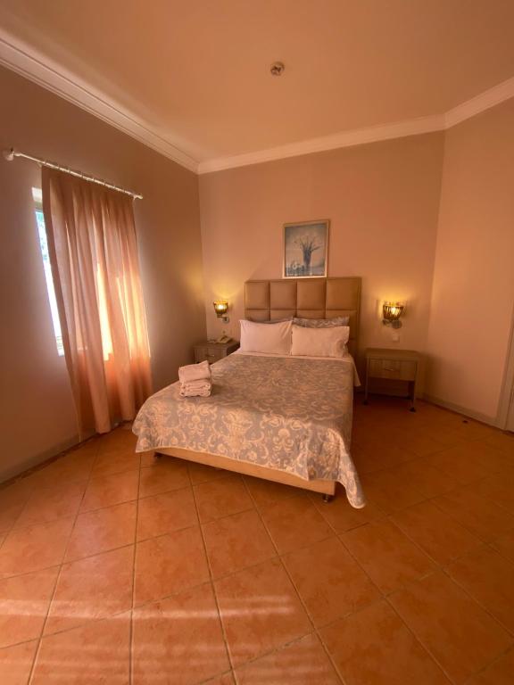 Postel nebo postele na pokoji v ubytování Amilla Beach Resort Bodrum - All Inclusive