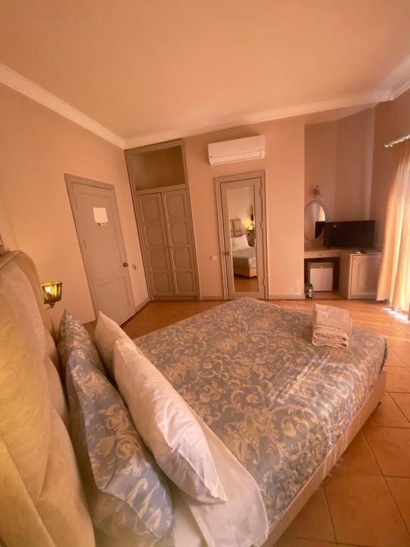 Postel nebo postele na pokoji v ubytování Amilla Beach Resort Bodrum - All Inclusive