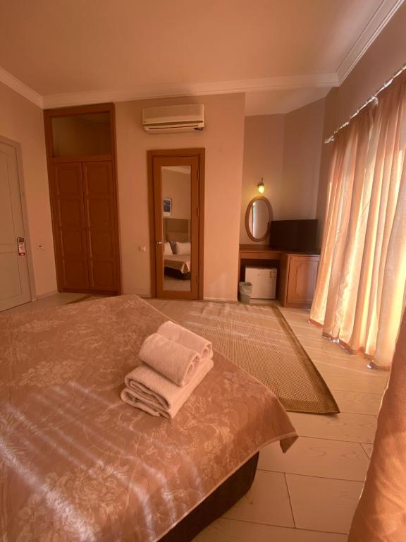 Postel nebo postele na pokoji v ubytování Amilla Beach Resort Bodrum - All Inclusive