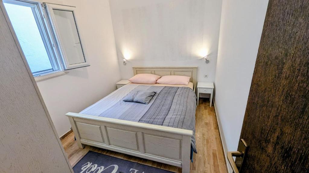 Postel nebo postele na pokoji v ubytování Paradies Apartments Prizba