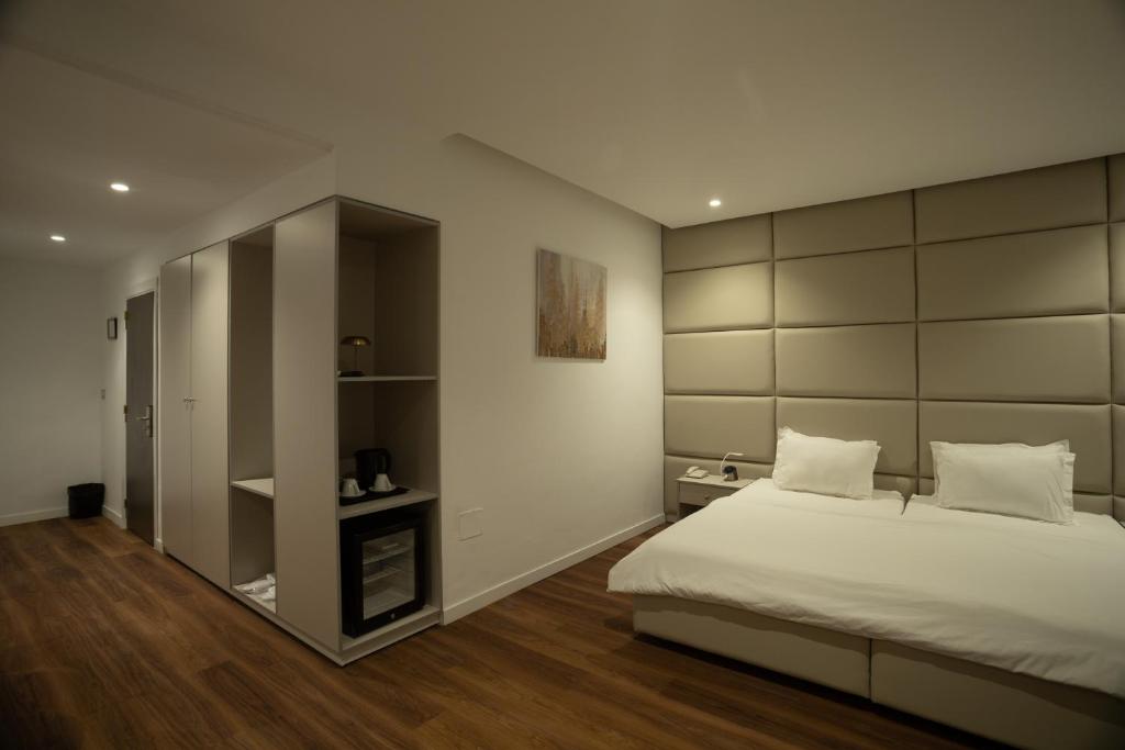 Postel nebo postele na pokoji v ubytování hotel donia sfax