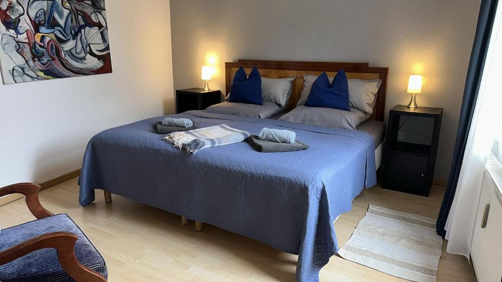 Postel nebo postele na pokoji v ubytování Art Apartment - Harz