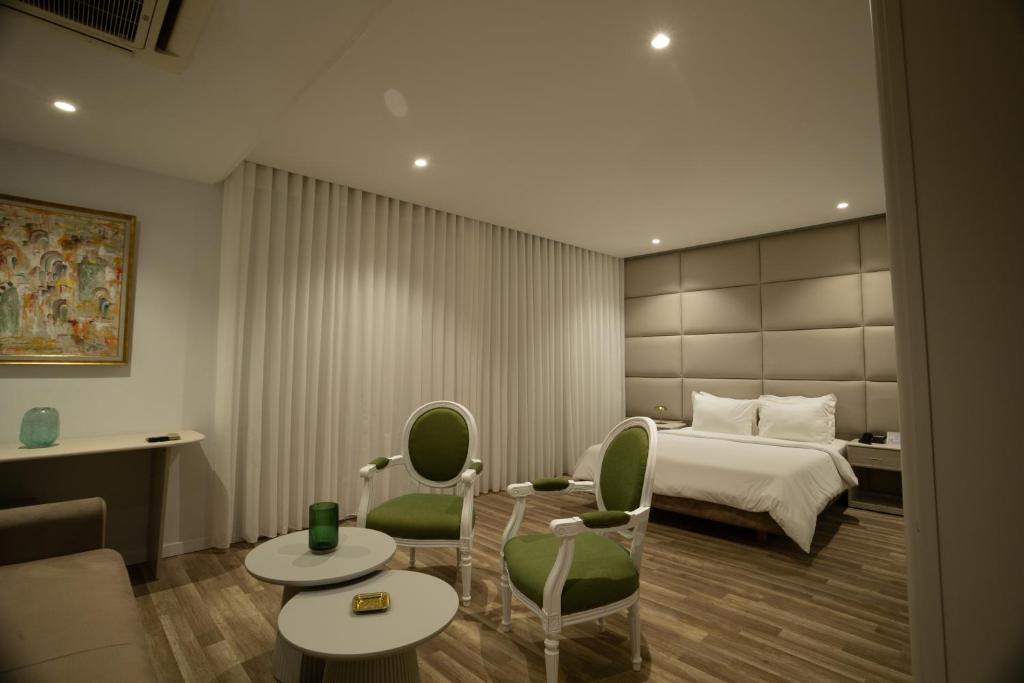 Postel nebo postele na pokoji v ubytování hotel donia sfax