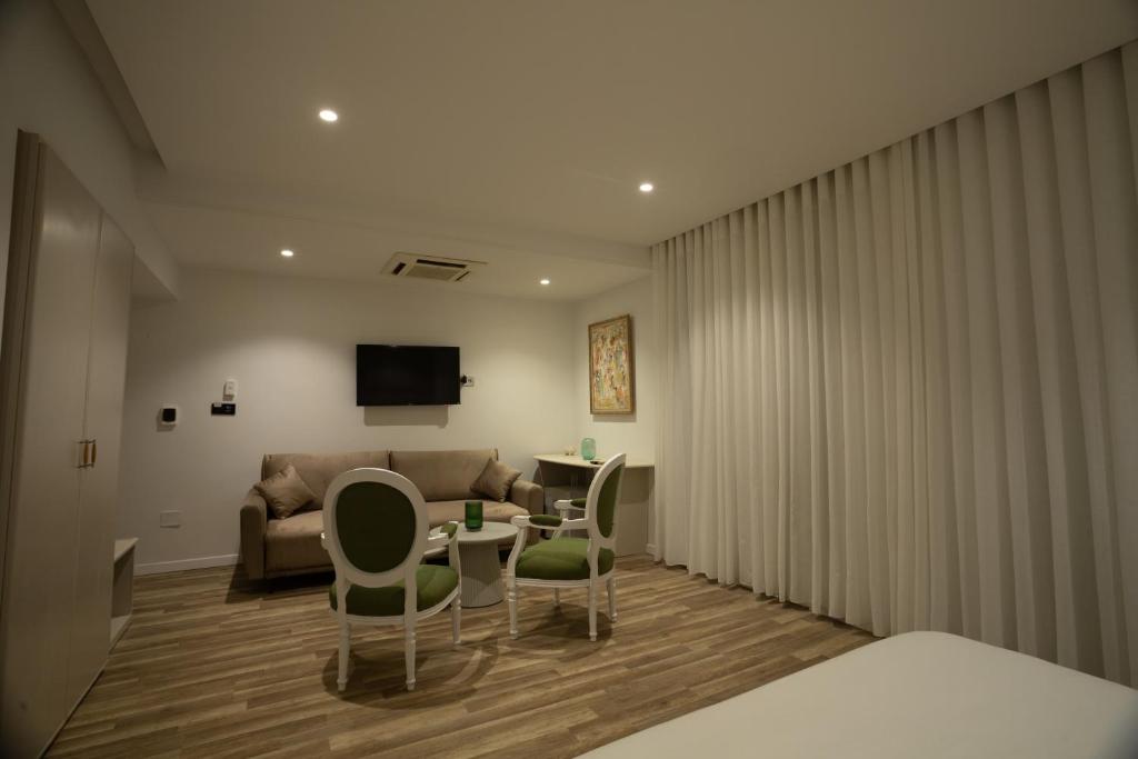 TV a/nebo společenská místnost v ubytování hotel donia sfax