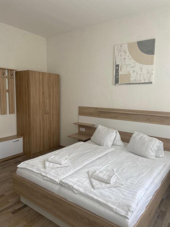 Postel nebo postele na pokoji v ubytování Penzion Obora