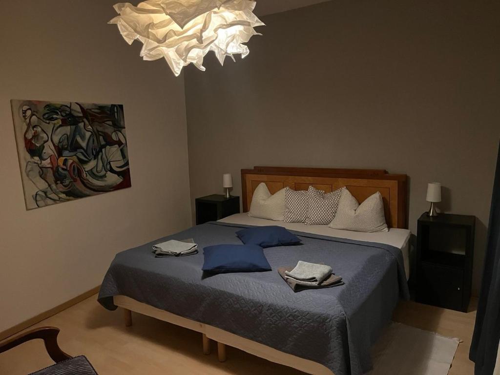 Postel nebo postele na pokoji v ubytování Art Apartment - Harz