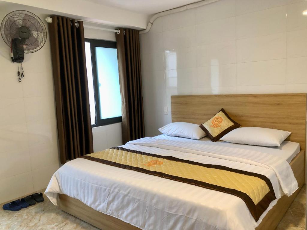 Postel nebo postele na pokoji v ubytování EaPuk Motel