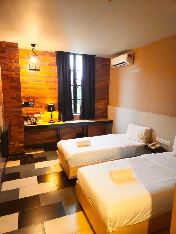 Postel nebo postele na pokoji v ubytování the youniQ Hotel, KLIA T1, KLIA T2