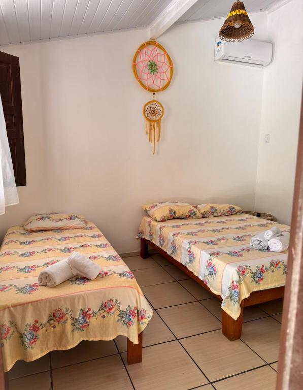 Postel nebo postele na pokoji v ubytování Pousada Arraial dos Sonhos
