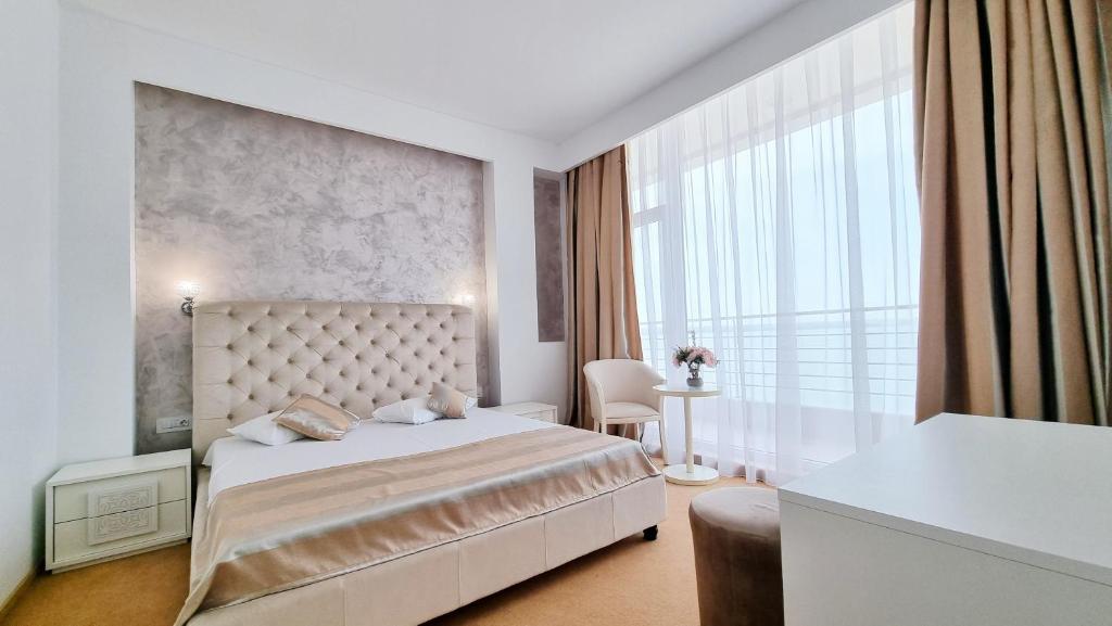 Postel nebo postele na pokoji v ubytování Hotel Scandinavia