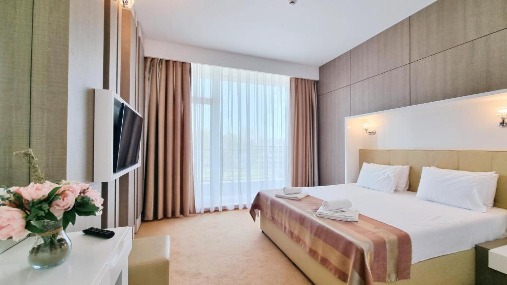 Postel nebo postele na pokoji v ubytování Hotel Scandinavia