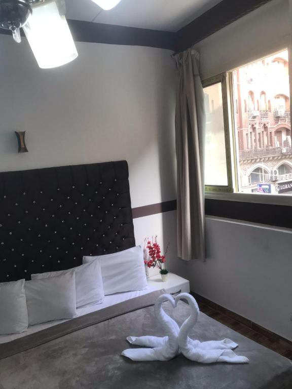 Postel nebo postele na pokoji v ubytování Hotel velvet One