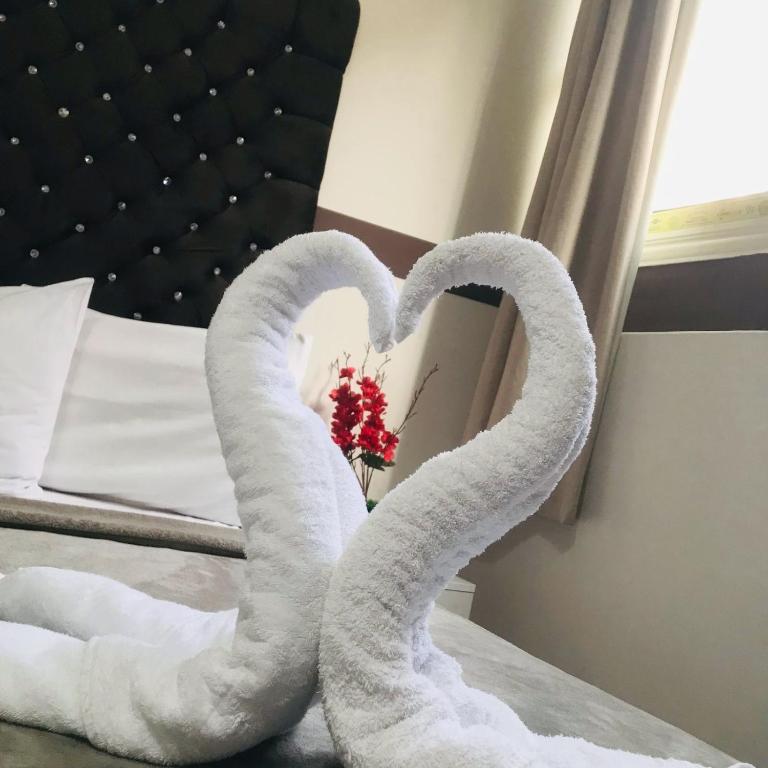 Postel nebo postele na pokoji v ubytování Hotel velvet One