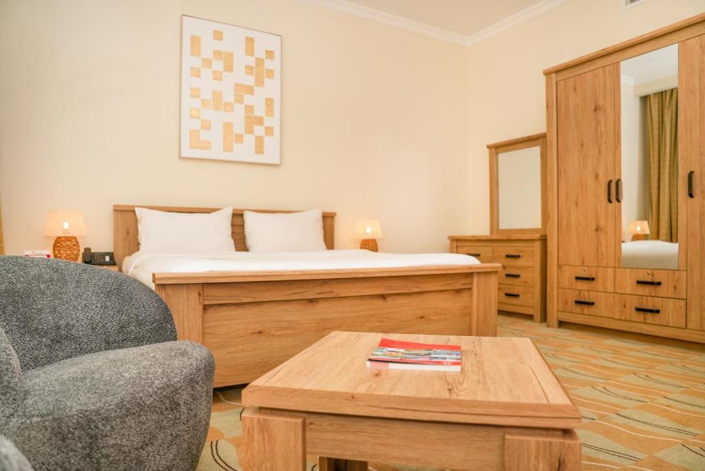 Posteľ alebo postele v izbe v ubytovaní Swiss-Belinn Doha