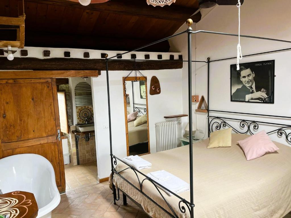 Postel nebo postele na pokoji v ubytování Monte Paradiso Agriturismo