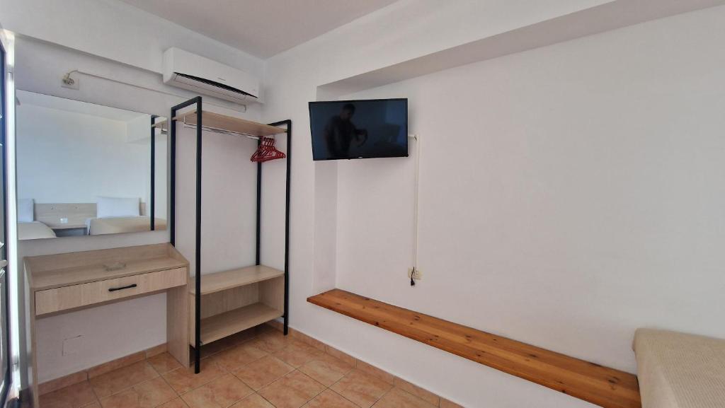 TV i/ili multimedijalni sistem u objektu Horizon view rooms