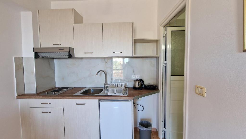 Kuhinja ili čajna kuhinja u objektu Horizon view rooms