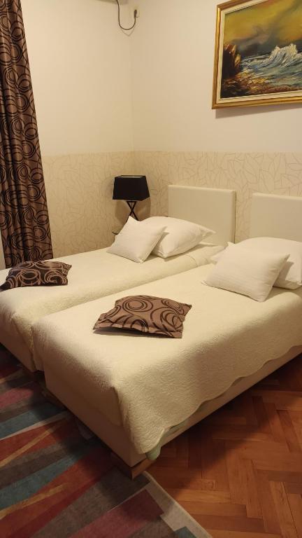 Postel nebo postele na pokoji v ubytování Guesthouse Vrlic