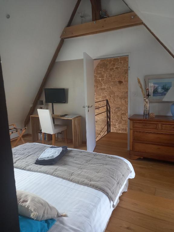 Postel nebo postele na pokoji v ubytování La chambre du Grand Val