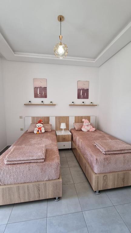 Postel nebo postele na pokoji v ubytování Appartement luxueux - Piscines, Plage 300m, Résidence fermée