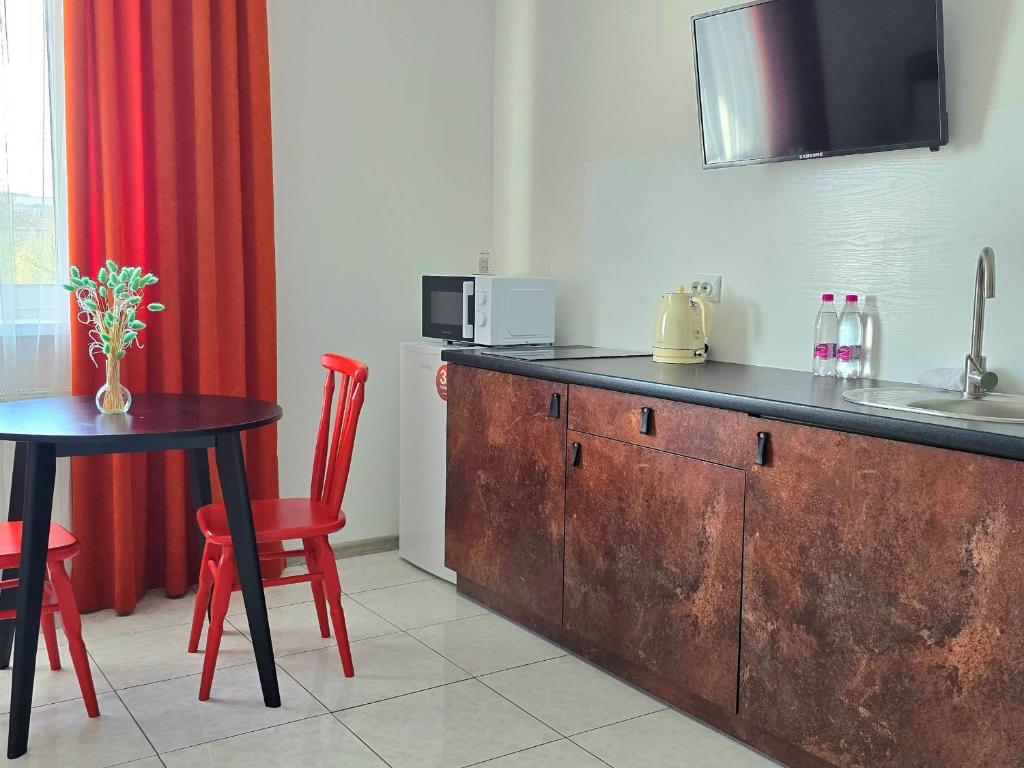 Kuchyň nebo kuchyňský kout v ubytování TREND HOUSE Apartments