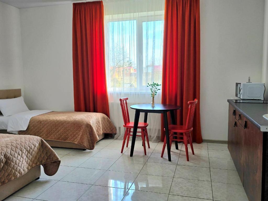 Postel nebo postele na pokoji v ubytování TREND HOUSE Apartments