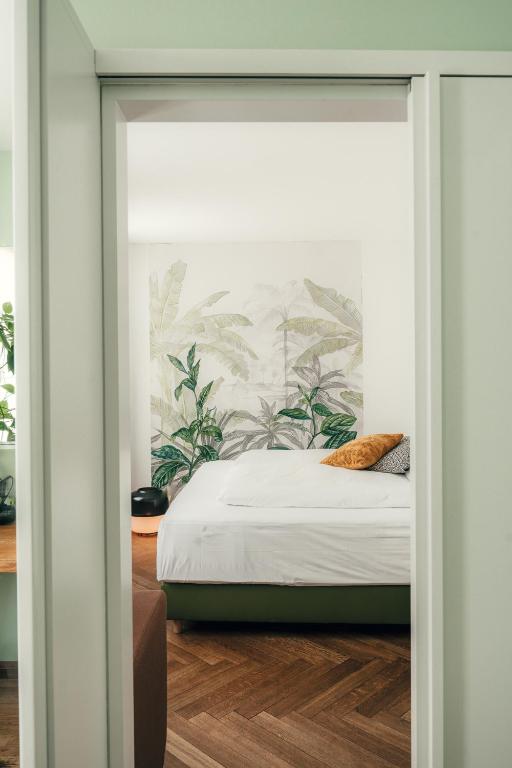 Postel nebo postele na pokoji v ubytování Consum Boutique Hotel
